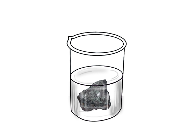 a lump of iron sat in a beaker of water, not reacting